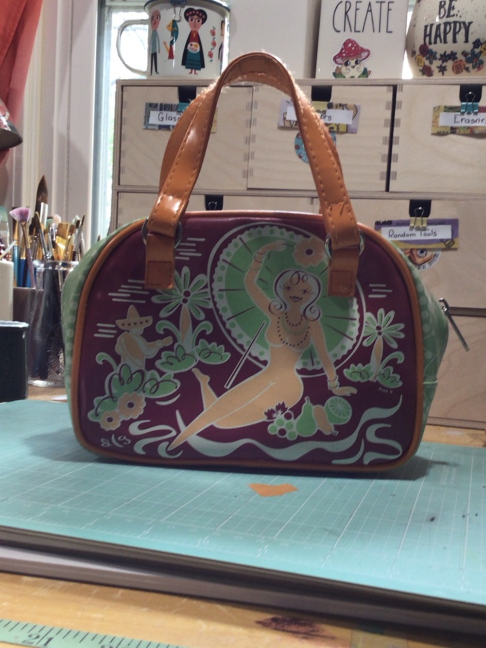 Benefit Dirty Girl Satchel Burgundy with Orange Handles and Mint Details